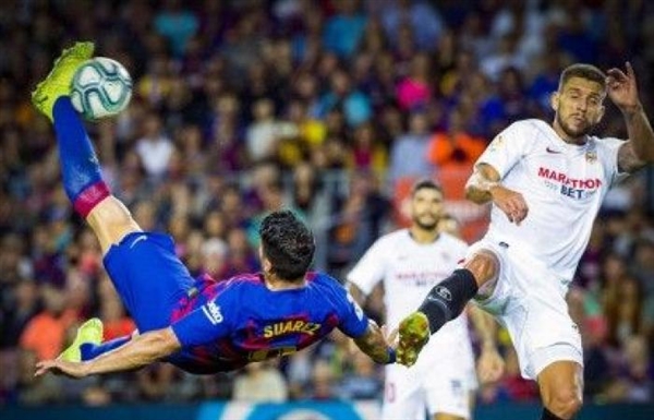 برشلونة يمطر شباك إشبيلية برباعية ويقفز لوصافة الليجا